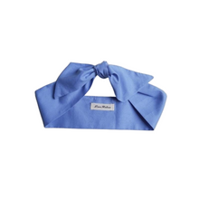 Load image into Gallery viewer, Blue bow-shaped headband on a white background