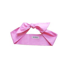 Load image into Gallery viewer, A candy pink cotton head tie displayed on a flat surface.