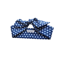 Load image into Gallery viewer, Navy blue headband with white polka dots on a white background