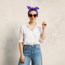 Load image into Gallery viewer, Woman wearing a purple head scarf and sunglasses