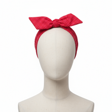 Load image into Gallery viewer, Red polka dot headband on a mannequin head against a white background