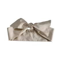 Load image into Gallery viewer, Cream cotton hair scarf with a large bow, featuring a label that reads "LanRetro.