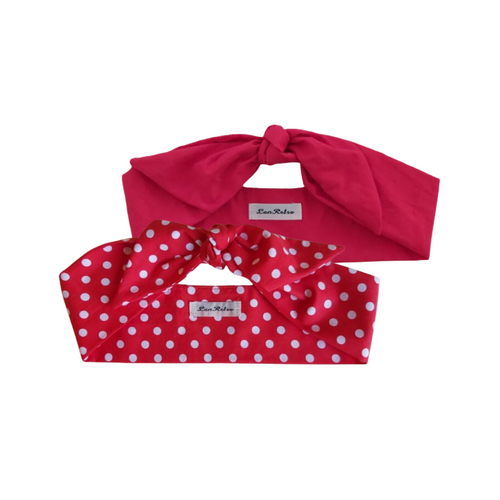 Two red coloured hair scarves, one solid red and the other with a red and white polka dot pattern, displayed on a neutral background.