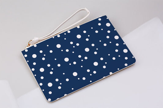 navy blue and white dotty clutch bag