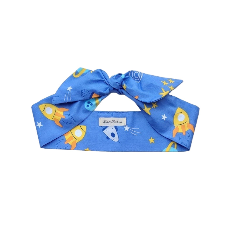 A blue cotton hair scarf with a space rockets print, displayed on a neutral background.