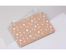 Load image into Gallery viewer, blush and white dotty print clutch bag on a light grey background