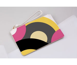 pink retro records clutch bag on a light grey background