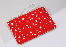Load image into Gallery viewer, red and white dotty clutch bag on a light grey background